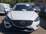 ✅ 2016 Mazda CX-5 Grand Touring • VIN: JM3KE4DY8G0908425 • Lot: 43350691. Wystawiony na IAAI z przebiegiem 144 684 mil. Bezpłatny archiwum sprzedaży aukcyjnych z USA i szczegółowy raport historii pojazdu na DreamBid. Zdjęcie 12.
