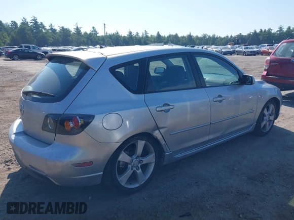 ✅ 2005 Mazda 3 s • VIN: JM1BK143351260133 • Lot: 42947331. Listed on IAAI with 158,209 mi. Free auction sales archive from the USA and detailed vehicle history report at DreamBid. Image 6.