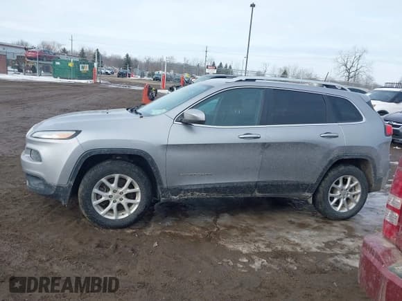 ✅ 2016 Jeep Cherokee Latitude • VIN: 1C4PJMCS5GW236487 • Лот: 41618915. Опубликован ранее на IAAI с пробегом 77 497 миль. Бесплатный доступ к архиву аукционных продаж из США и подробный отчёт об истории автомобиля на DreamBid. Изображение 14.