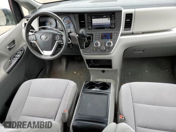 ✅ 2020 Toyota Sienna LE • VIN: 5TDJZ3DCXLS249696 • Lot: 64382785. Listed on Copart with 99,530 mi. Free auction sales archive from the USA and detailed vehicle history report at DreamBid. Image 8.