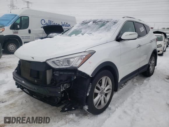 ✅ 2015 Hyundai Santa Fe • VIN: 5XYZW4LA9FG245951 • Лот: 38843274. Опубликован ранее на Copart с пробегом 143 884 миль. Бесплатный доступ к архиву аукционных продаж из США и подробный отчёт об истории автомобиля на DreamBid. Изображение 1.