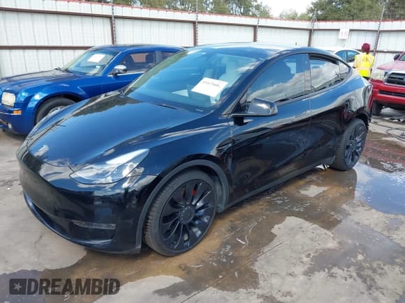 ✅ 2022 Tesla Model Y Performance • VIN: 7SAYGDEF1NF456488 • Lot: 43473602. Listed on IAAI with 36,476 mi. Free auction sales archive from the USA and detailed vehicle history report at DreamBid. Image 19.