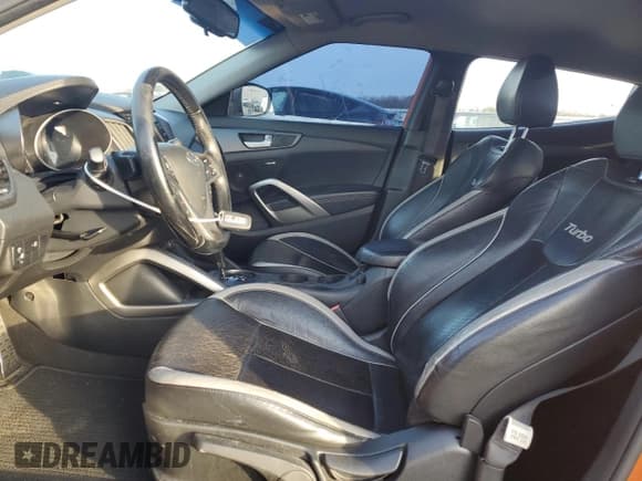 ✅ 2014 Hyundai Veloster Turbo • VIN: KMHTC6AE2EU193216 • Lot: 85075714. Listed on Copart with 96,611 mi. Free auction sales archive from the USA and detailed vehicle history report at DreamBid. Image 7.