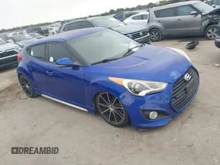 ✅ 2013 Hyundai Veloster Turbo • VIN: KMHTC6AE9DU181238 • Lot: 43525329. Listed on IAAI with 121,343 mi. Free auction sales archive from the USA and detailed vehicle history report at DreamBid. Image 1.