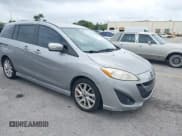 ✅ 2013 Mazda 5 Touring • VIN: JM1CW2CL5D0160104 • Lot: 41722470. Listed on IAAI with 135,708 mi. Free auction sales archive from the USA and detailed vehicle history report at DreamBid. Image 1.
