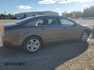 ✅ 2012 Chevrolet Malibu 1LS • VIN: 1G1ZB5E04CF328975 • Lot: 75605814. Listed on Copart with 112,288 mi. Free auction sales archive from the USA and detailed vehicle history report at DreamBid. Image 3.