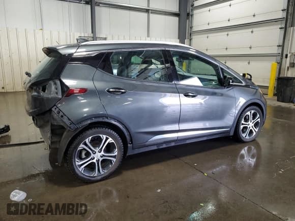 ✅ 2018 Chevrolet Bolt EV Premier • VIN: 1G1FX6S04J4108808 • Lot: 82117425. Listed on Copart with 54,651 mi. Free auction sales archive from the USA and detailed vehicle history report at DreamBid. Image 3.