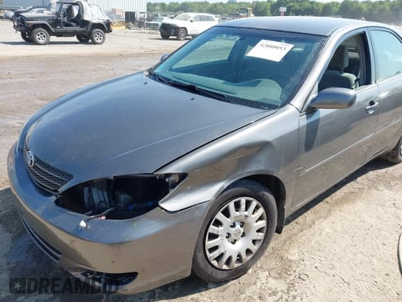 ✅ 2004 Toyota Camry LE • VIN: 4T1BE30K94U798456 • Lot: 42880053. Wystawiony na IAAI z przebiegiem 166 011 mil. Bezpłatny archiwum sprzedaży aukcyjnych z USA i szczegółowy raport historii pojazdu na DreamBid. Zdjęcie 6.