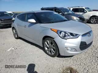 2017 Hyundai Veloster z VIN KMHTC6AD6HU313515, wystawiony jako Copart lot #67322364 z przebiegiem 52 208 mil mil oraz Szkoda całkowita • Salvage title. Historia ofert i sprzedaży dostępna na DreamBid. Obrazek 4.