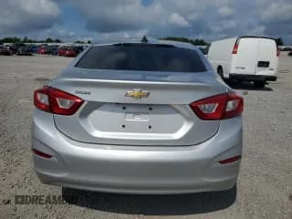 ✅ 2018 Chevrolet Cruze LS • VIN: 1G1BC5SM1J7110778 • Lot: 64843555. Listed on Copart with 125,661 mi. Free auction sales archive from the USA and detailed vehicle history report at DreamBid. Image 6.