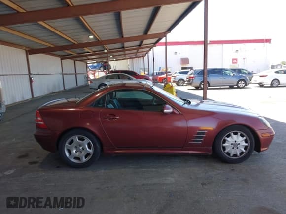 ✅ 2002 Mercedes-Benz SLK 230 Kompressor • VIN: WDBKK49F32F252115 • Lot: 42353986. Listed on IAAI with 192,789 mi. Free auction sales archive from the USA and detailed vehicle history report at DreamBid. Image 13.