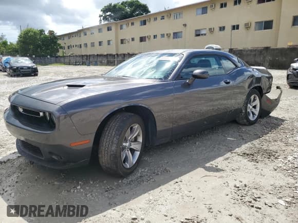 ✅ 2022 Dodge Challenger SXT • VIN: 2C3CDZAG7NH151877 • Lot: 69487744. Wystawiony na Copart z przebiegiem 45 583 mil. Bezpłatny archiwum sprzedaży aukcyjnych z USA i szczegółowy raport historii pojazdu na DreamBid. Zdjęcie 1.