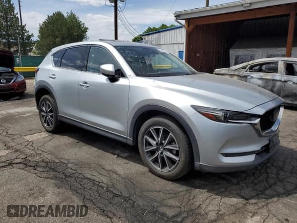✅ 2018 Mazda CX-5 Grand Touring • VIN: JM3KFADMXJ1375195 • Lot: 66651055. Wystawiony na Copart z przebiegiem 66 800 mil. Bezpłatny archiwum sprzedaży aukcyjnych z USA i szczegółowy raport historii pojazdu na DreamBid. Zdjęcie 4.