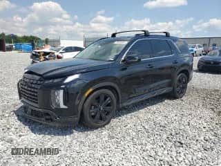2023 Hyundai Palisade XRT с VIN KM8R34GE7PU490054, выставлен на аукционе Copart как лот 56938585 с пробегом 91 596 миль миль и На запчасти • Non repairable. История ставок и продаж доступна на DreamBid. Изображение 1.