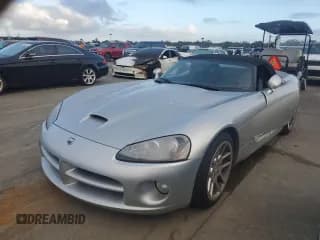 ✅ 2004 Dodge Viper SRT-10 • VIN: 1B3JZ65Z94V100094 • Lot: 74979634. Listed on Copart with Not provided. Free auction sales archive from the USA and detailed vehicle history report at DreamBid. Image 1.