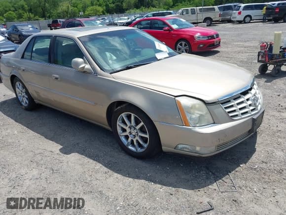 ✅ 2006 Cadillac DTS 1SE • VIN: 1G6KD57936U245734 • Lot: 42238256. Listed on IAAI with 209,188 mi. Free auction sales archive from the USA and detailed vehicle history report at DreamBid. Image 1.