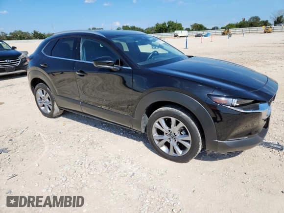 ✅ 2023 Mazda CX-30 S Premium • VIN: 3MVDMBDM4PM546563 • Lot: 67591215. Listed on Copart with 10,757 mi. Free auction sales archive from the USA and detailed vehicle history report at DreamBid. Image 4.