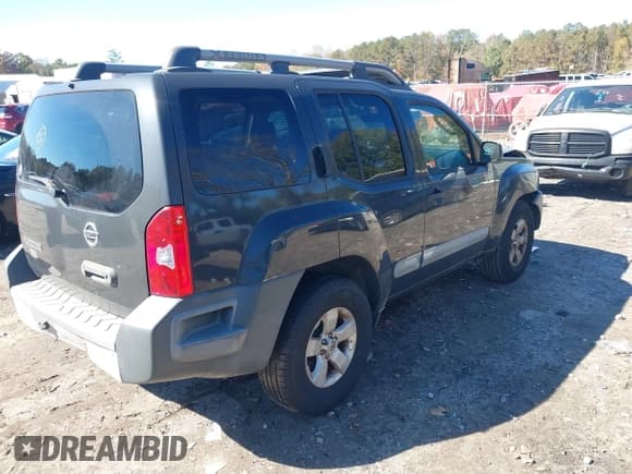 ✅ 2011 Nissan Xterra X • VIN: 5N1AN0NU4BC520958 • Lot: 43615013. Listed on IAAI with 208,529 mi. Free auction sales archive from the USA and detailed vehicle history report at DreamBid. Image 4.