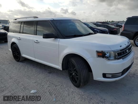 ✅ 2018 Ford Flex SEL • VIN: 2FMGK5C8XJBA04575 • Лот: 53667065. Опубликован ранее на Copart с пробегом 124 281 миль. Бесплатный доступ к архиву аукционных продаж из США и подробный отчёт об истории автомобиля на DreamBid. Изображение 4.