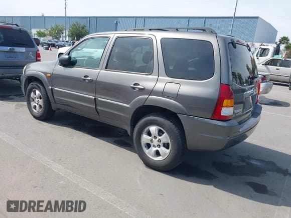 ✅ 2003 Mazda Tribute LX • VIN: 4F2YZ04193KM08890 • Лот: 42158385. Опубликован ранее на IAAI с пробегом 282 314 миль. Бесплатный доступ к архиву аукционных продаж из США и подробный отчёт об истории автомобиля на DreamBid. Изображение 3.