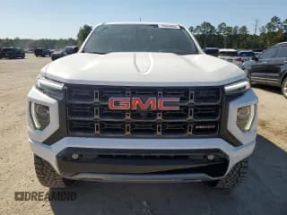 ✅ 2023 GMC Canyon 4WD AT4X • VIN: 1GTP6EEK6P1235222 • Lot: 75664684. Listed on Copart with 9,736 mi. Free auction sales archive from the USA and detailed vehicle history report at DreamBid. Image 5.