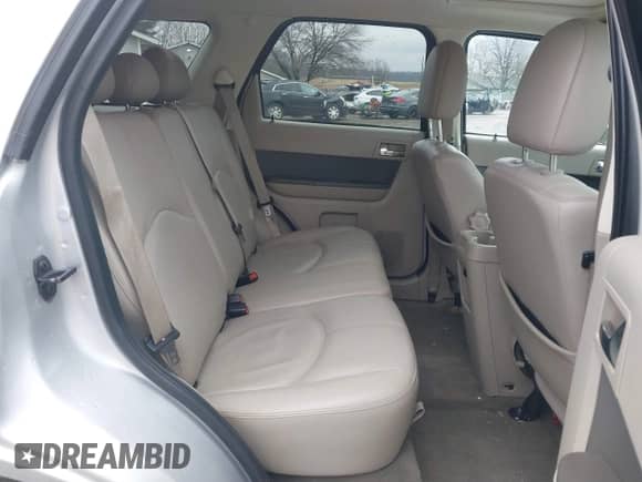 2009 Mercury Mariner Premier with VIN 4M2CU97719KJ15260, listed as a IAAI auction lot 41500367 with 104,063 mi miles and . Bid and sale history available at DreamBid. Image 8.