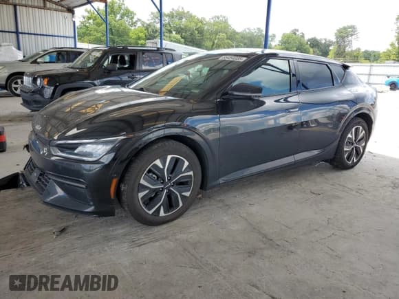 ✅ 2022 Kia EV6 GT-Line • VIN: KNDC44LA8N5030970 • Лот: 65454035. Опубликован ранее на Copart с пробегом 63 086 миль. Бесплатный доступ к архиву аукционных продаж из США и подробный отчёт об истории автомобиля на DreamBid. Изображение 1.