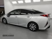 ✅ 2021 Toyota Prius LE • VIN: JTDKAMFPXM3190461 • Лот: 85264545. Опубликован ранее на Copart с пробегом 149 598 миль. Бесплатный доступ к архиву аукционных продаж из США и подробный отчёт об истории автомобиля на DreamBid. Изображение 2.