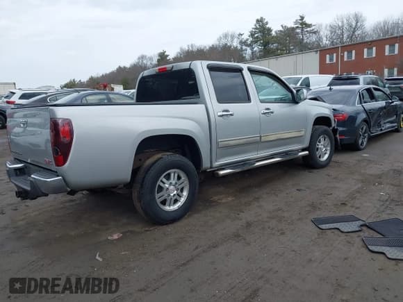 ✅ 2012 GMC Canyon SLE1 • VIN: 1GTH6MFEXC8106683 • Lot: 41673272. Listed on IAAI with 90,337 mi. Free auction sales archive from the USA and detailed vehicle history report at DreamBid. Image 4.