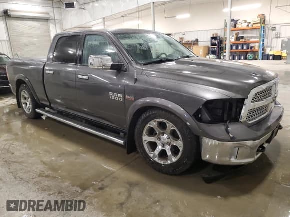 ✅ 2014 Ram 1500 Laramie • VIN: 1C6RR7VT7ES438560 • Лот: 93435175. Опубликован ранее на Copart с пробегом 170 289 миль. Бесплатный доступ к архиву аукционных продаж из США и подробный отчёт об истории автомобиля на DreamBid. Изображение 4.