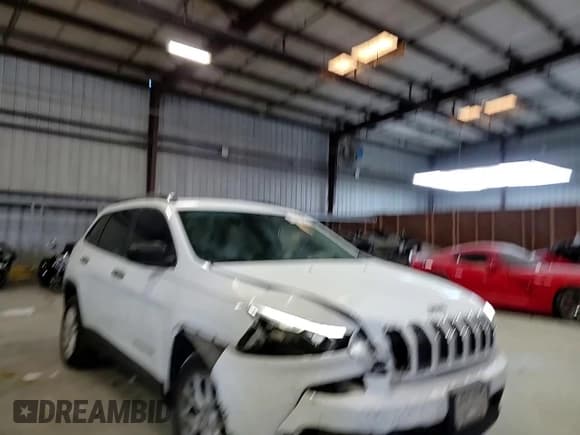 ✅ 2016 Jeep Cherokee Sport • VIN: 1C4PJLAB8GW274177 • Lot: 91631385. Listed on Copart with 243,464 mi. Free auction sales archive from the USA and detailed vehicle history report at DreamBid. Image 14.