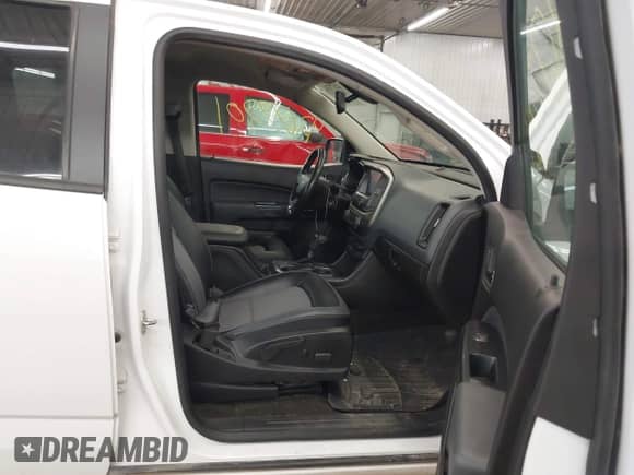 2015 Chevrolet Colorado 4WD Z71 z VIN 1GCGTCE36F1265552, wystawiony jako IAAI lot #42677201 z przebiegiem 168 895 mil mil oraz . Historia ofert i sprzedaży dostępna na DreamBid. Obrazek 5.