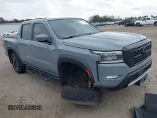 2022 Nissan Frontier Pro-4X z VIN 1N6ED1EK3NN672166, wystawiony jako IAAI lot #41764333 z przebiegiem 64 003 mil mil oraz . Historia ofert i sprzedaży dostępna na DreamBid. Obrazek 1.