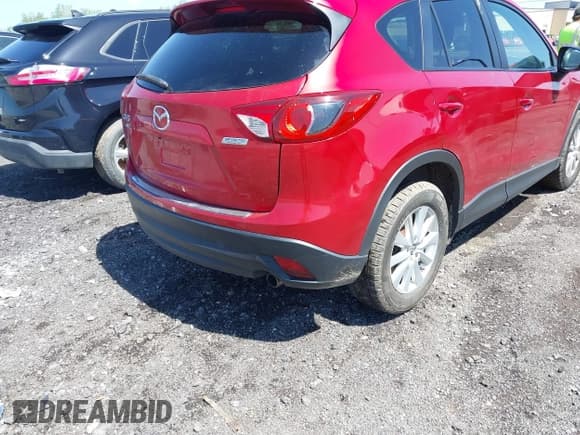 ✅ 2014 Mazda CX-5 Touring • VIN: JM3KE4CY5E0318214 • Lot: 42252680. Wystawiony na IAAI z przebiegiem 102 255 mil. Bezpłatny archiwum sprzedaży aukcyjnych z USA i szczegółowy raport historii pojazdu na DreamBid. Zdjęcie 4.