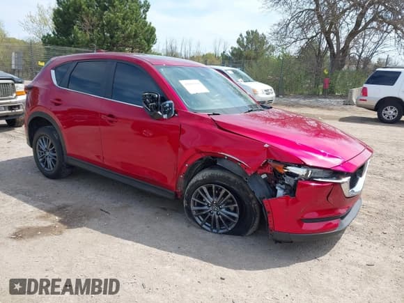 ✅ 2020 Mazda CX-5 Touring • VIN: JM3KFBCM2L0846174 • Lot: 42203758. Wystawiony na IAAI z przebiegiem 58 617 mil. Bezpłatny archiwum sprzedaży aukcyjnych z USA i szczegółowy raport historii pojazdu na DreamBid. Zdjęcie 1.