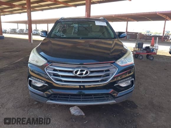 2018 Hyundai Santa Fe 2.4L z VIN 5NMZU3LB8JH066582, wystawiony jako IAAI lot #43283643 z przebiegiem 117 648 mil mil oraz . Historia ofert i sprzedaży dostępna na DreamBid. Obrazek 12.