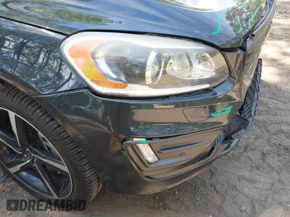 ✅ 2014 Volvo XC60 R-Design Premier Plus • VIN: YV4902DZ4E2555246 • Lot: 42120389. Listed on IAAI with 97,993 mi. Free auction sales archive from the USA and detailed vehicle history report at DreamBid. Image 6.