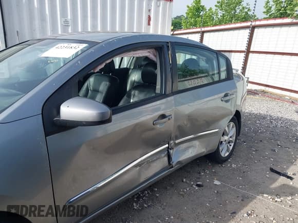 ✅ 2011 Nissan Sentra SL • VIN: 3N1AB6APXBL620456 • Lot: 42231832. Listed on IAAI with 124,430 mi. Free auction sales archive from the USA and detailed vehicle history report at DreamBid. Image 6.