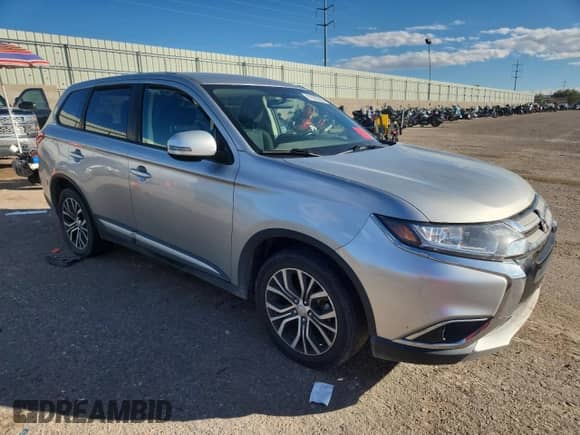 2018 Mitsubishi Outlander SE with VIN JA4AD3A39JJ004198, listed as a Copart auction lot 87282365 with 140,590 mi miles and Clean title. Bid and sale history available at DreamBid. Image 4.