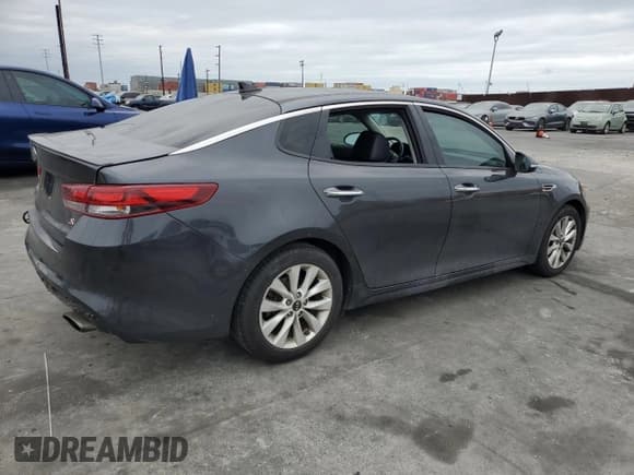 ✅ 2018 Kia Optima S • VIN: 5XXGT4L32JG245725 • Lot: 53742475. Listed on Copart with 90,415 mi. Free auction sales archive from the USA and detailed vehicle history report at DreamBid. Image 3.