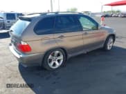 ✅ 2004 BMW X5 4.4i • VIN: 5UXFB53514LV04214 • Lot: 42923638. Listed on IAAI with 164,010 mi. Free auction sales archive from the USA and detailed vehicle history report at DreamBid. Image 4.