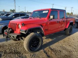✅ 2022 Jeep Gladiator Texas Trail • VIN: 1C6HJTAG0NL180848 • Лот: 71494965. Опубликован ранее на Copart с пробегом 39 869 миль. Бесплатный доступ к архиву аукционных продаж из США и подробный отчёт об истории автомобиля на DreamBid. Изображение 1.