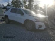 ✅ 2022 Chevrolet Traverse LT Cloth • VIN: 1GNEVGKW9NJ167435 • Lot: 81002475. Listed on Copart with 48,616 mi. Free auction sales archive from the USA and detailed vehicle history report at DreamBid. Image 4.