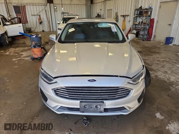 ✅ 2019 Ford Fusion SEL • VIN: 3FA6P0CD3KR269672 • Лот: 91709295. Опубликован ранее на Copart с пробегом 123 925 миль. Бесплатный доступ к архиву аукционных продаж из США и подробный отчёт об истории автомобиля на DreamBid. Изображение 5.