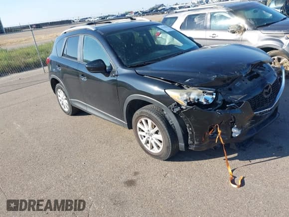 ✅ 2014 Mazda CX-5 Touring • VIN: JM3KE4CY3E0302724 • Lot: 43319905. Wystawiony na IAAI z przebiegiem 128 003 mil. Bezpłatny archiwum sprzedaży aukcyjnych z USA i szczegółowy raport historii pojazdu na DreamBid. Zdjęcie 1.