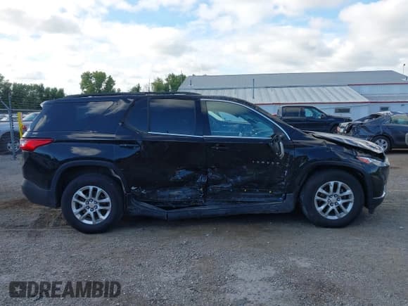✅ 2021 Chevrolet Traverse LT Cloth • VIN: 1GNEVGKW2MJ173656 • Lot: 43159539. Wystawiony na IAAI z przebiegiem 146 588 mil. Bezpłatny archiwum sprzedaży aukcyjnych z USA i szczegółowy raport historii pojazdu na DreamBid. Zdjęcie 13.