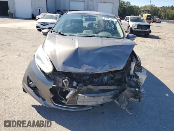 ✅ 2014 Ford Fiesta Titanium • VIN: 3FADP4CJ2EM232988 • Lot: 87364135. Wystawiony na Copart z przebiegiem 148 880 mil. Bezpłatny archiwum sprzedaży aukcyjnych z USA i szczegółowy raport historii pojazdu na DreamBid. Zdjęcie 5.