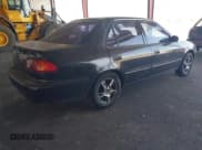 ✅ 1999 Toyota Corolla VE • VIN: 1NXBR12E0XZ197084 • Lot: 43220717. Listed on IAAI with 169,897 mi. Free auction sales archive from the USA and detailed vehicle history report at DreamBid. Image 4.