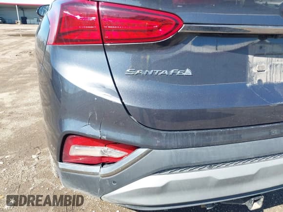 ✅ 2020 Hyundai Santa Fe Limited • VIN: 5NMS5CAA0LH208063 • Лот: 42131296. Опубликован ранее на IAAI с пробегом 65 030 миль. Бесплатный доступ к архиву аукционных продаж из США и подробный отчёт об истории автомобиля на DreamBid. Изображение 18.