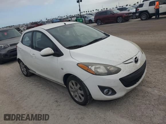 ✅ 2013 Mazda 2 Touring • VIN: JM1DE1LZ8D0164038 • Лот: 76509584. Опубликован ранее на Copart с пробегом 141 550 миль. Бесплатный доступ к архиву аукционных продаж из США и подробный отчёт об истории автомобиля на DreamBid. Изображение 4.